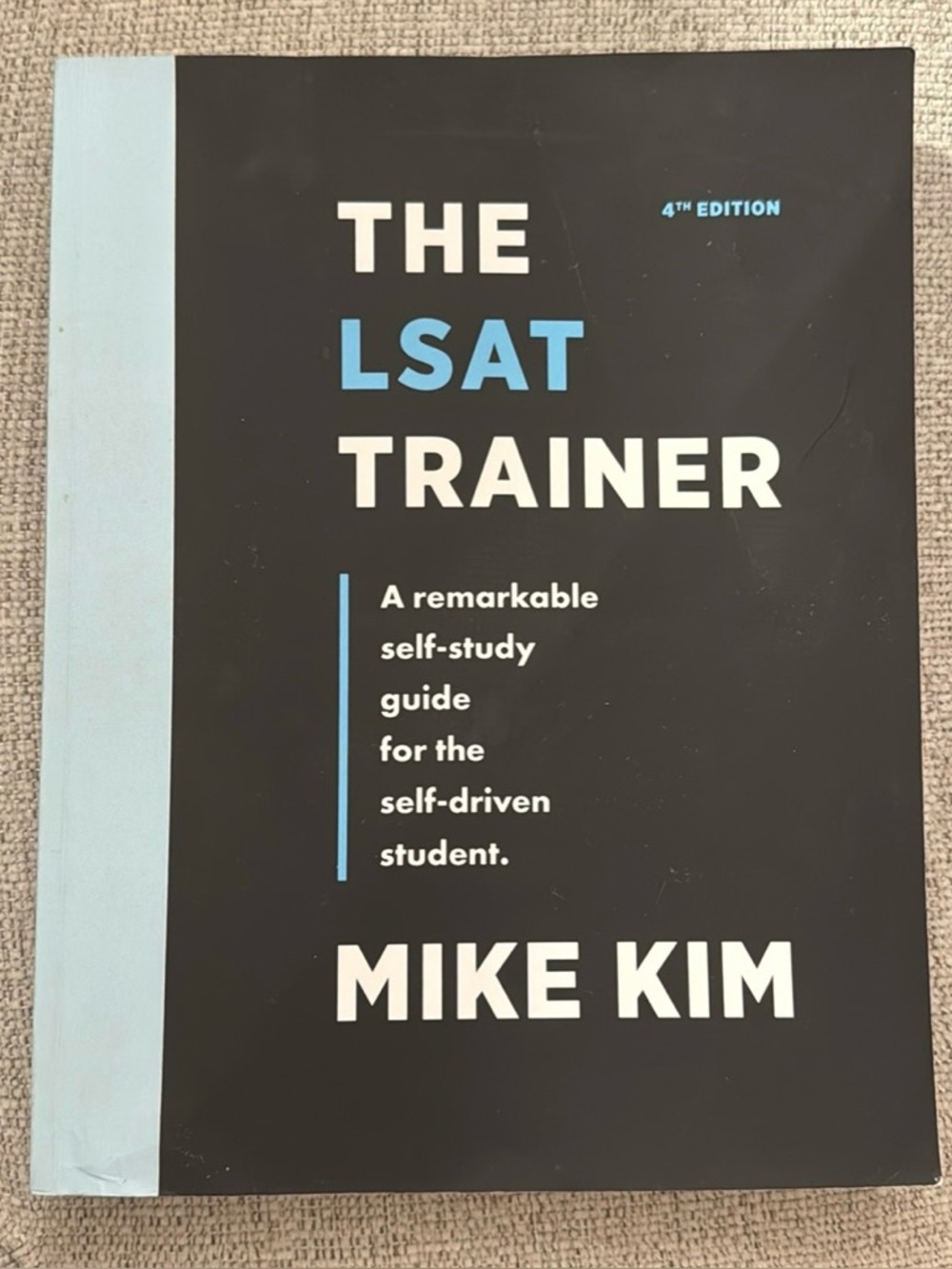 The LSAT Trainer by Mike Kim - Black & Light Blue Cover